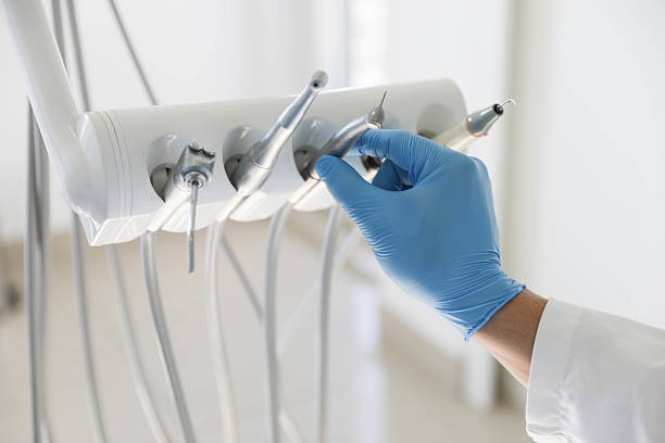Professional Tooth Extraction technician working in Quinlan, TX